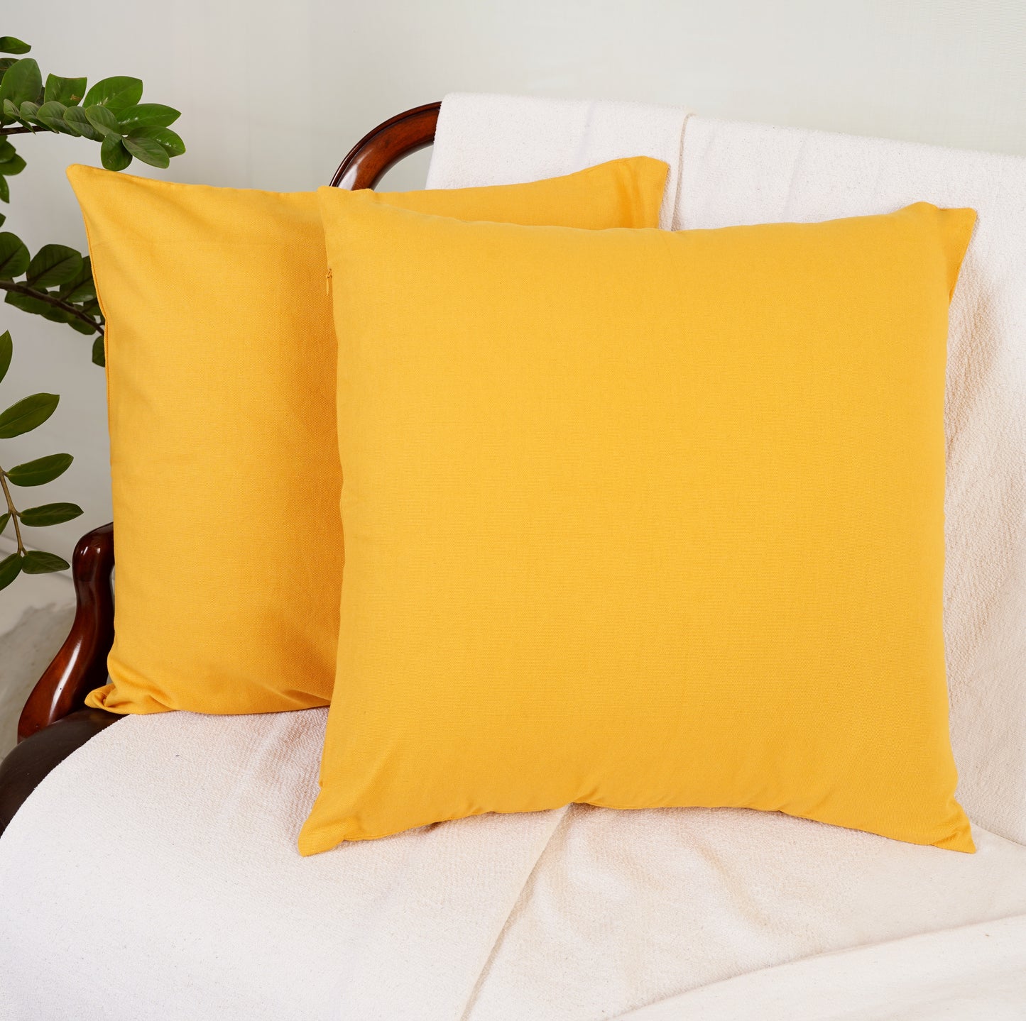 18"x18" Bright yellow cotton throw pillow cover by Rely+ displayed on a modern sofa, showcasing elegant home decor Rely+ Yellow Cotton Pillow Cover for Living Room Decor